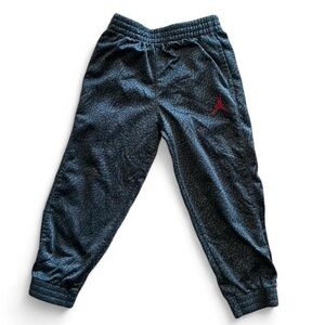Jordan Kids Black Patterned Joggers with Red Logo size 3T